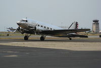 N41HQ @ OAK - USAAC HQ Command Douglas DC-3A (as NC41HQ) taxying in smoky conditions @ Oakland, CA - by Steve Nation