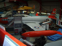 51-4419 @ EGBE - Lockheed T-33A displayed inside the main, but cramped hangar - by chrishall