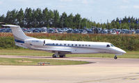 G-CJMD @ EGGW - British Embraer Legacy taxies out at Luton for departure to Moscow - by Terry Fletcher