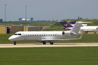 N77331 @ CID - Seen from my office window, departing runway 13 - by Glenn E. Chatfield