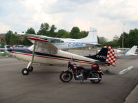 C-FFYL @ CYKZ - Fresh Paint on Ramp at Buttonville (Truimph Bonneville in Foreground) - by Ian Sutcliffe