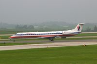 N642AE @ CID - Seen from my office window, departing runway 13 - by Glenn E. Chatfield
