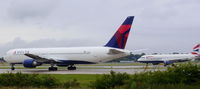 N1602 @ EGCC - Delta - by chrishall