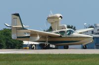 N5028L @ KOSH - Takeoff roll 18R - by Larry G. Johnson