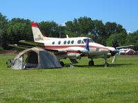 N944K @ OSH - If I fueled a King Air, I'd sleep in a tent, too!  Airventure 2008 - Oshkosh, WI - by Bob Simmermon