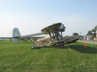 N50V @ OSH - 1931 Sikorsky S-39-C Amphibian, P&W R-985 450 Hp. How many of these do you see every day? OSH EAA AirVenture annually is the place to see the old, the new, the rare exotic and everything in-between. - by Doug Robertson