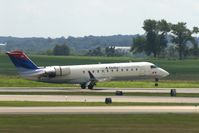 N925EV @ CID - Arriving on runway 27, just after touching down - by Glenn E. Chatfield