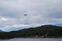N6868B - In Ketchikan, Passing By - by Larry Tiffin