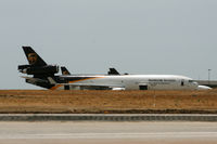 N257UP @ DFW - UPS ramp at DFW - by Zane Adams