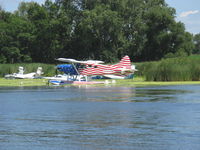 N100KL @ 96WI - 1955 DeHavilland DHC-2 Mk.1 (L20A) BEAVER, P&W PT6A Turboprop upgrade, Wipaire's colorful Turbo BEAVER.  - by Doug Robertson