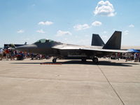 02-4040 @ KOFF - F-22 RAPTOR WITH B-2 IN THE BACK GROUND - by Gary Schenaman