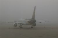 N403UP @ CID - Early morning fog on the UPS ramp.