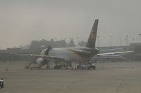 N437UP @ CID - Early morning fog on the UPS ramp.