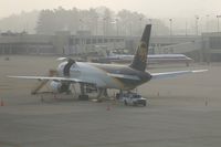 N437UP @ CID - Early morning fog on the UPS ramp.  Fog is clearing - by Glenn E. Chatfield