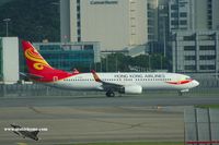B-KBM @ VHHH - Hong Kong Airlines aligned for take-off - by Michel Teiten ( www.mablehome.com )