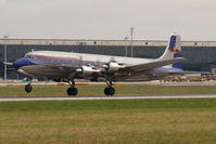 N996DM @ VIE - Red Bull DC6 - by Yakfreak - VAP