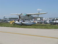C-FHOG @ OSH - 2002 Bair Cessna T206H Turbo STATIONAIR Amphibian, Lycoming TIO-540-AJ1A 310 Hp - by Doug Robertson