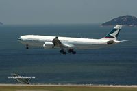 B-HXE @ VHHH - Cathay Pacific touching down on runway 25R - by Michel Teiten ( www.mablehome.com )