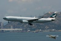 B-HLI @ VHHH - Cathay Pacific approaching runway 25R - by Michel Teiten ( www.mablehome.com )