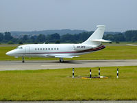 CS-DFD @ EGPH - Netjets Falcon 2000 taxiing to RWY06 - by Mike stanners