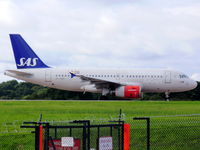 OY-KBP @ EGCC - Scandinavian Airlines - by chris hall