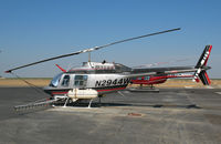 N2944W @ DLO - San Joaquin Helicopters 1971 Bell 206B sprayer @ Delano, CA - by Steve Nation