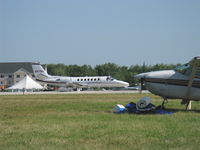 N97BH @ OSH - Cessna CITATION V 560, two P&W(C)JT15D-4B 2,500 lb st Turbofans, takeoff roll Rwy 09 - by Doug Robertson