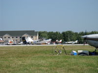 C-FEFT @ OSH - 1967 Helio H-250A COURIER 2 STOL, Lycoming O-540-A2B 250 Hp, takeoff roll Rwy 09 - by Doug Robertson