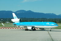 PH-KCG @ CYVR - PH-KCG MD-11  - KLM Taxiing Vancouver - by David Burrell