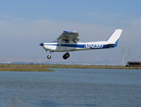 N24351 @ PAO - 1977 Cessna 152 landing @ Palo Alto, CA - by Steve Nation