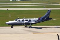 N707LK @ CID - Taxiing to Runway 27 for departure. - by Glenn E. Chatfield