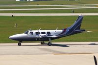 N707LK @ CID - Taxiing to Runway 27 for departure.