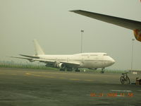 TF-ARU @ WIII - B-747 on Garuda maintenance ramp at Jakarta - by John J. Boling