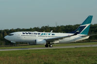 C-FWBG @ CYKF - Taking off Runway 07 to Calgary - by Shawn Hathaway