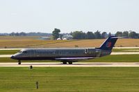 N965SW @ CID - Back-taxiing on Runway 31 after landing - by Glenn E. Chatfield