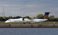 D-ADHA @ EGLC - Lufthansa Dash 8 at London City - by Terry Fletcher