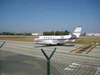 N602QS @ KVNY - Taxiing to RWY 16R - by Chris Allegro