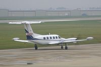 N444CY @ CID - Taxiing to Runway 13 for departure, foggy morning - by Glenn E. Chatfield