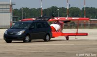 N260HP @ NKT - Being towed in by the minivan - by Paul Perry