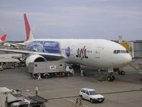 JA704J @ RJAA - Narita Airport , Spcl cs One World - by Henk Geerlings