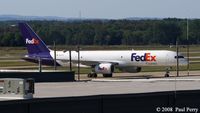 N901FD @ IAD - Headed for the cargo ramp - by Paul Perry