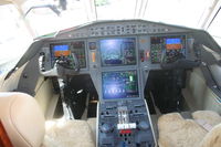 N900EX @ ORL - Falcon 900LX cockpit - by Florida Metal