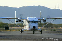 N26LH @ E60 - One of Skydive Arizona's Skyvans taxies in for fuel. - by Dave G