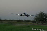 N86584 @ E60 - DC-3 low approach scatters the birds. - by Dave G