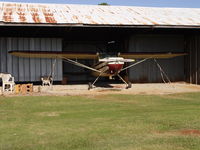 N2032V @ GA2 - 32V resting at GA2. - by J. Michael Travis