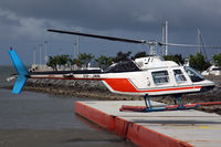 VH-JMN - Cairns Harbour heliport at the Shang-ri-la hotel - by Nick Dean