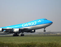 PH-CKA @ EHAM - Landing runway 18R - by Henk Geerlings