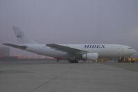 A6-MDC @ VIE - Midex A300 - by Yakfreak - VAP