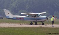 N1464E @ SFQ - A little guidance at the fly-in - by Paul Perry