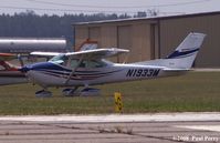 N1933M @ SFQ - Taking a rest on the grass ramp - by Paul Perry